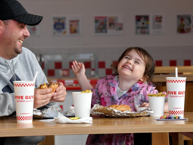 Two-year-old Sophie Burrow and her dad John were the first customers.