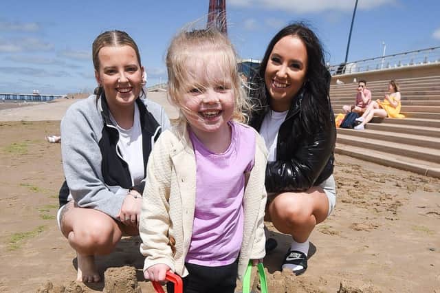Amelia Turner, aged 3 building sandcastles on Blackpool beach, with Shannon Turner and Chloe Nay.