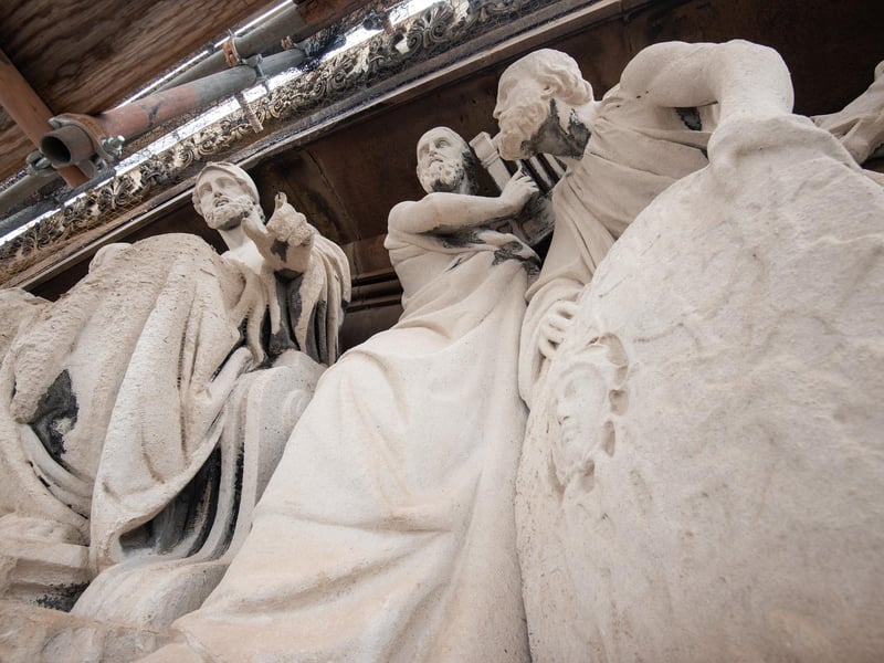 The stature of the statues cannot be fully appreciated from the street