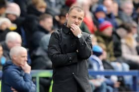 Wigan Athletic manager Shaun Maloney reacts in the technical area