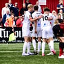 Nick Haughton is congratulated after his goal (photo: Steve Mclellan/AFC Fylde)