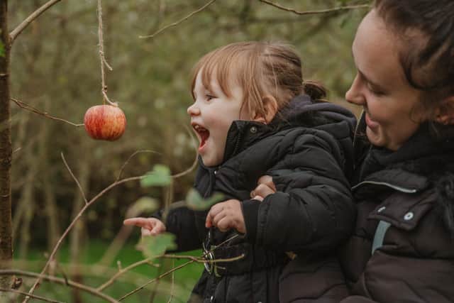Local Bolton children celebrating apple day at The Roost At Bright Meadows in Breightmet. Photo:  Tom Benson Photography