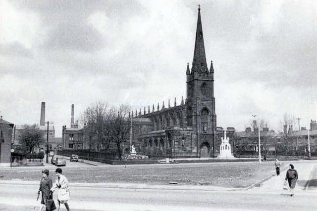 St. Ignatius Church: St. Ignatius Church on Meadow Street, Preston - pictured here in 1965. This Roman Catholic church is a Grade II* listed building that was designed by J. J. Scoles, with the chancel, chapels, and transepts added in 1858 by J. A. Hansom, and further alterations in 1885–86. It is built in sandstone and has slate roofs. The church is in Perpendicular style, and consists of a nave, aisles, transepts, a chancel with chapels, and a steeple flanked by a chapel and a baptistry. On the tower are battlements and corner pinnacles, and there are more pinnacles along the sides of the clerestory