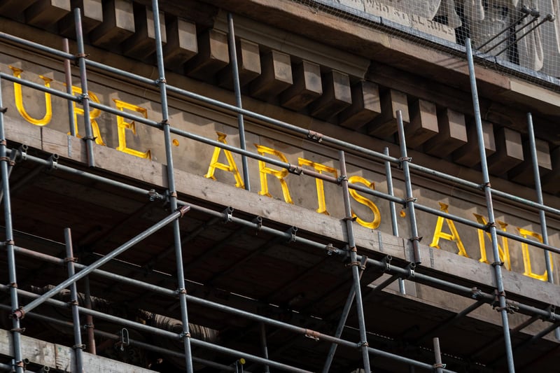 The lettering of the inscription that tops the building has been re-gilded