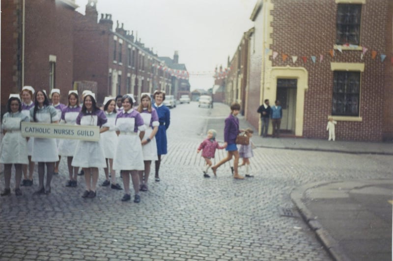 This picture was sent in by Mrs Smith from Fulwood,Preston it shows the St Gregory's Procession on Blackpool Road which was part of the Preston Guild 1972.