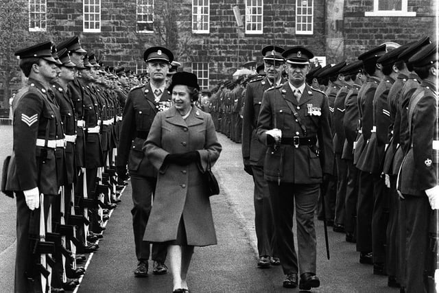 Queen Elizabeth meets servicemen during a visit to Fulwood Barracks on May 19 1979
