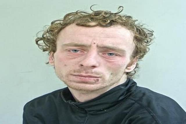 Phillip Williams knocked a 65-year-old man to the ground before robbing him of £200 (Credit: Lancashire Police)