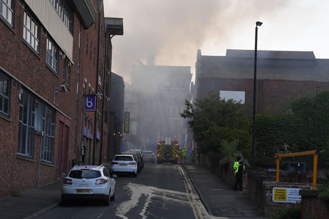The latest scenes are firefighters battle the blaze.