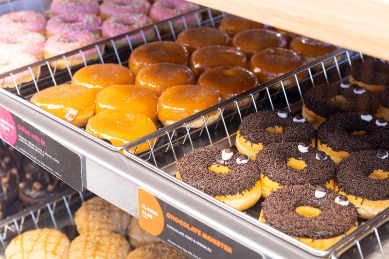 A selection of sweet treats and cups available ahead of the opening of Dunkin Donuts at the Capitol Centre, Preston. Photo: Kelvin Stuttard
