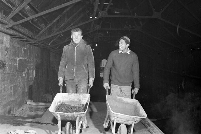 Boxers Angus Thomson and Eddie Philips at work in the Edinburgh Brewery in February 1960.