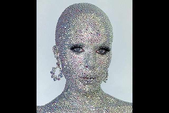 In a separate video, Holly removed her 27 hours' worth of work - which showed the liquid latex the rhinestones were glued to.