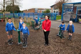 1.	Pictured with Redrow’s Fran Kent are pupils LtR Faris, Hollie, Lauren, Seb, Zain and Ayda.