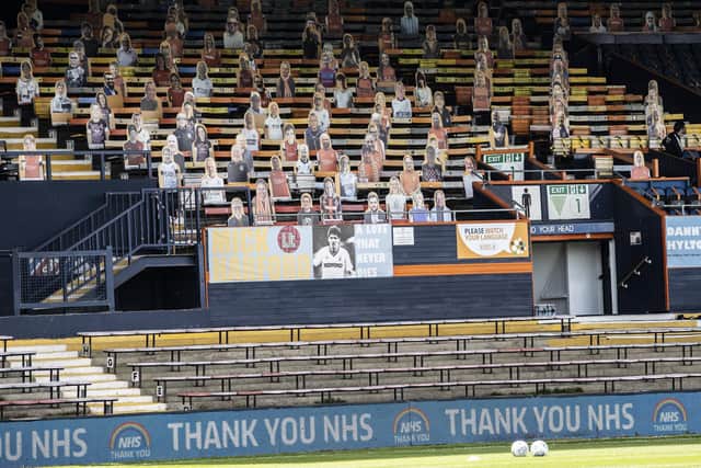 Luton use cardboard cutouts to replace their supporters whilst they are not allowed into the ground.