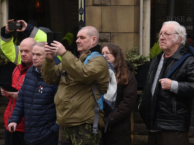 Members of the public lined the streets