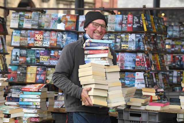 Derek Walsh on Derek's Books stall, Preston Market
