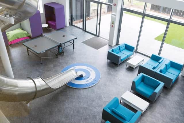 Inside the coolest office in Preston - the former EKM HQ with its people slide.