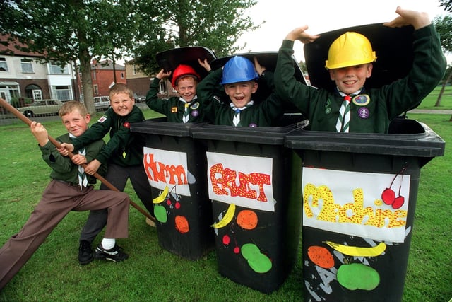 Cub scouts from the 46th Preston (Notre Dame) from left, Anthony Reid, 10, Thomas Russell, 9, Jonathan Reid, 9, Darren Walls, 8, and William Walls, 9 perform the Human Fruit Machine during the Moorbrook School Summer Fete held at the school in Ainsley Road in Fulwood, Preston