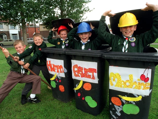 Cub scouts from the 46th Preston (Notre Dame) from left, Anthony Reid, 10, Thomas Russell, 9, Jonathan Reid, 9, Darren Walls, 8, and William Walls, 9 perform the Human Fruit Machine during the Moorbrook School Summer Fete held at the school in Ainsley Road in Fulwood, Preston