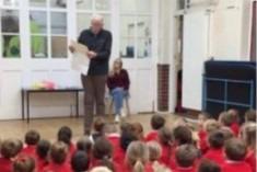 Mr Woosley came in to school to show the children his grandfather's medal, some photos and regaled them with stories