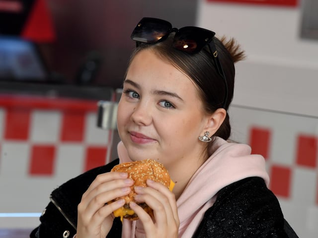 Maddie ready to enjoy her first meal at the new eatery.