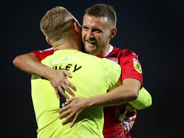 Shane McLoughlin (right) was one of 10 players transfer-listed at the end of last season Picture: Lewis Storey/Getty Images