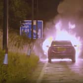 North West Traffic Officers are called into action after a car bursts into flames on the M6