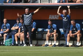 Preston North End manager Ryan Lowe alongside his coaching staff