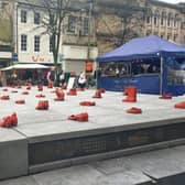 The red shoes installation in Market Square on Saturday, which formed part of the 16 Days of Activism event.