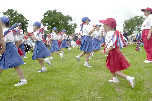 Garstang Morris Dancers entertain the crowds at Winmarleigh Field Day