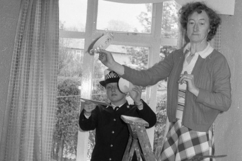 It was a tough job for the police flying squad as two bats thwarted all their efforts to catch them at a home in Blackpool Road, Preston. Householder Mrs Eileen Bamforth can be seen up the ladder, watched closely by WPC Gillian Haggarty