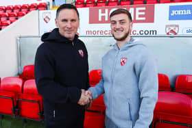Morecambe boss Ged Brannan and Charlie Brown after the striker penned a new deal with the Shrimps Picture: Morecambe FC