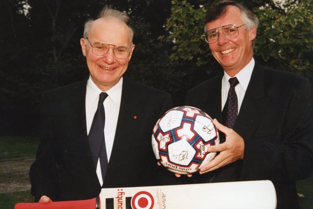 Dunstan Melling and Mike Flynn, the first and latest head teachers of All Hallows RC High School, Penwortham, swap a few sporting memories at a sportsman's dinner held at the Mansion House, Longton in 1995