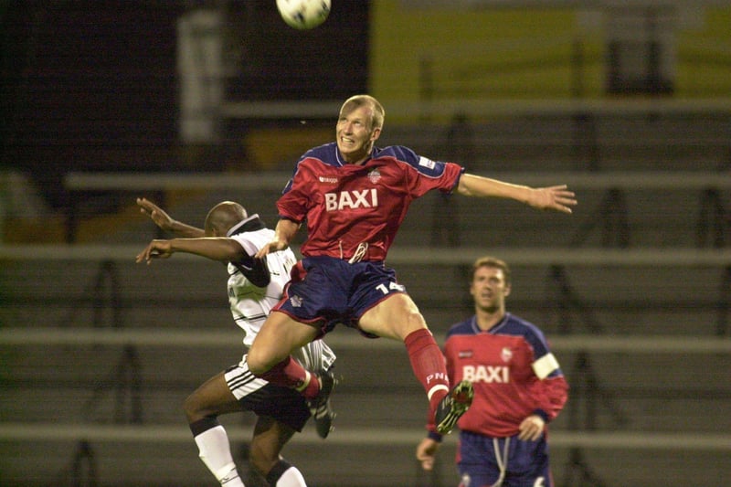 Colin Murdock beats Barry Hayles during the Fulham v Preston North End  match at Craven Cottage
