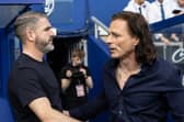 Ryan Lowe is greeted by Gareth Ainsworth