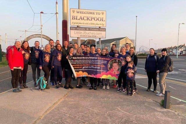 A group of walkers who took part in the Blackpool to Chorley sponsored walk to raise funds for Indie Thomas who has been diagnosed with an irreversible brain tumour