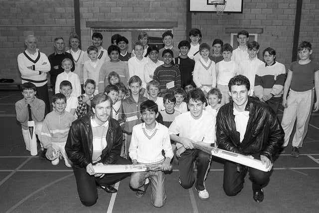 A soccer club which encourages youngsters to take up cricket held its first awards presentation. Preston North End players Stephen Wilkes and Shaun Allen went along to Brownedge St Mary's School in Bamber Bridge to congratulate the first graduates of the course held under the new Deepdale Community Programme. Pictured are Stephen (left) and Shaun presenting bats to Farouk Munshi and Mark Nicklin
