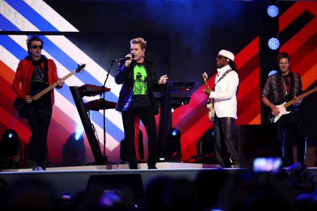 (L-R) John Taylor, Simon Le Bon and Andy Taylor of Duran Duran with Nile Rodgers perform during the Platinum Party At The Palace at Buckingham Palace on June 4, 2022.
