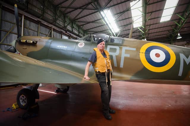 The Polish Spitfire was on display at Hangar 42 at Blackpool Airport last year. Pictured is aviation museum volunteer Paul Lomax