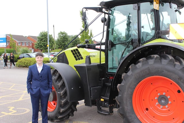 The classic prom photo with a tractor...