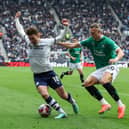PNE's Ryan Ledson is fouled by Plymouth Argyle's Maksym Talovierov