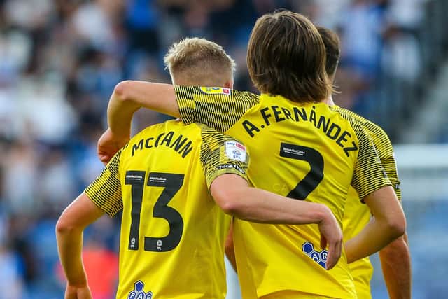 Ali McCann, the scorer of two of PNE's goals, alongside Alvaro Fernandez, the provider of them.
