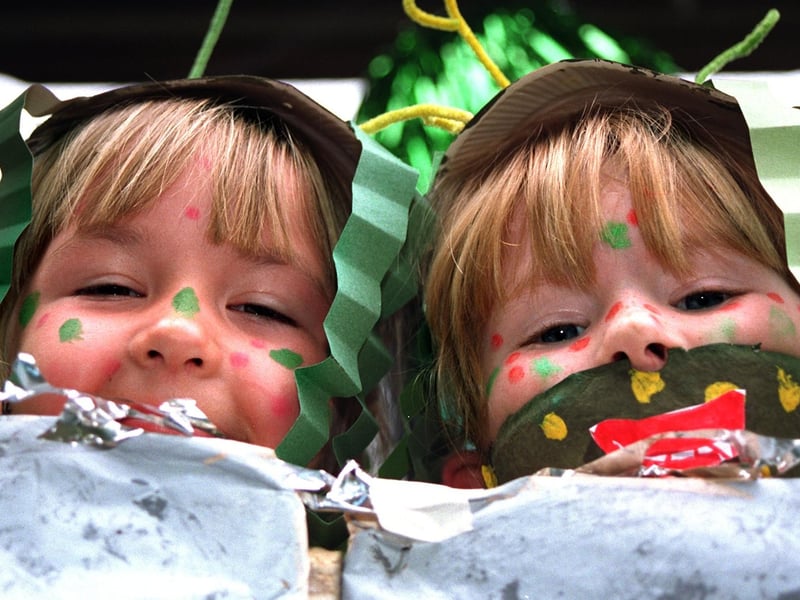 Penwortham gala aliens... Kelly Leighton, seven, and Laura Dundavan, six, on the Broad Oak Primary School float