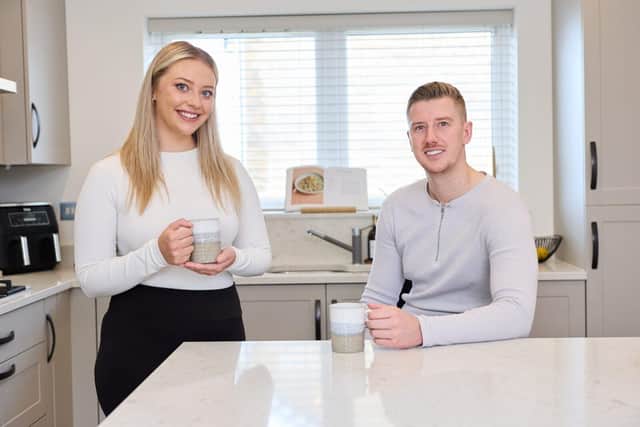 Ellen and Liam in their new home. Photo: Kingswood Homes
