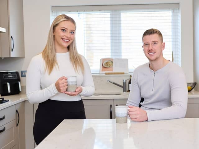 Ellen and Liam in their new home. Photo: Kingswood Homes
