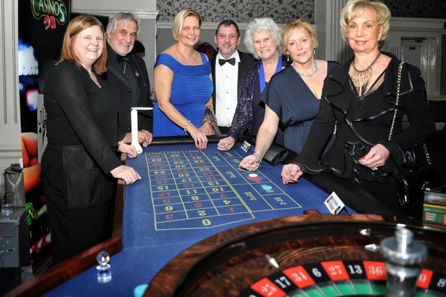 A group of guests enjoy a game of roulette at the Mayor of Chorley's Charity Ball at Park Hall Hotel, Charnock Richard