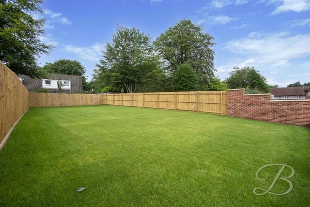 Not quite Wembley, but not far off! This palatial, newly-laid lawn, fully enclosed, occupies part of the back garden.