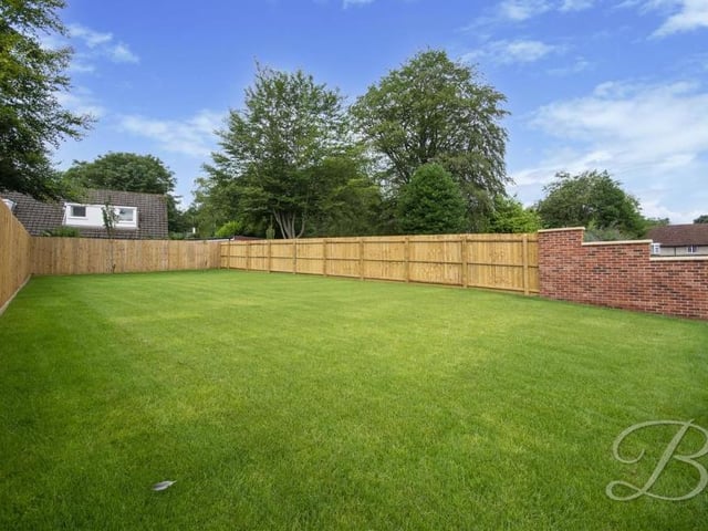 Not quite Wembley, but not far off! This palatial, newly-laid lawn, fully enclosed, occupies part of the back garden.