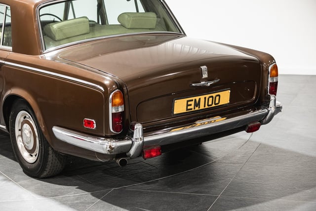 The Rolls Royce Silver Shadow owned by Eric Morecambe is walnut brown. Picture from Iconic Auctioneers.