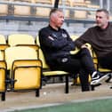 Darren Ferguson with Posh chairman Darragh MacAnthony.