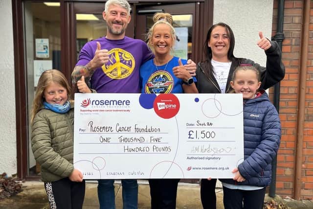 Annie with Karl, daughter Lucie and granddaughters Bridget (left) and Aurora with their donation